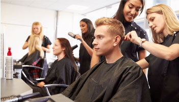 students cutting hair